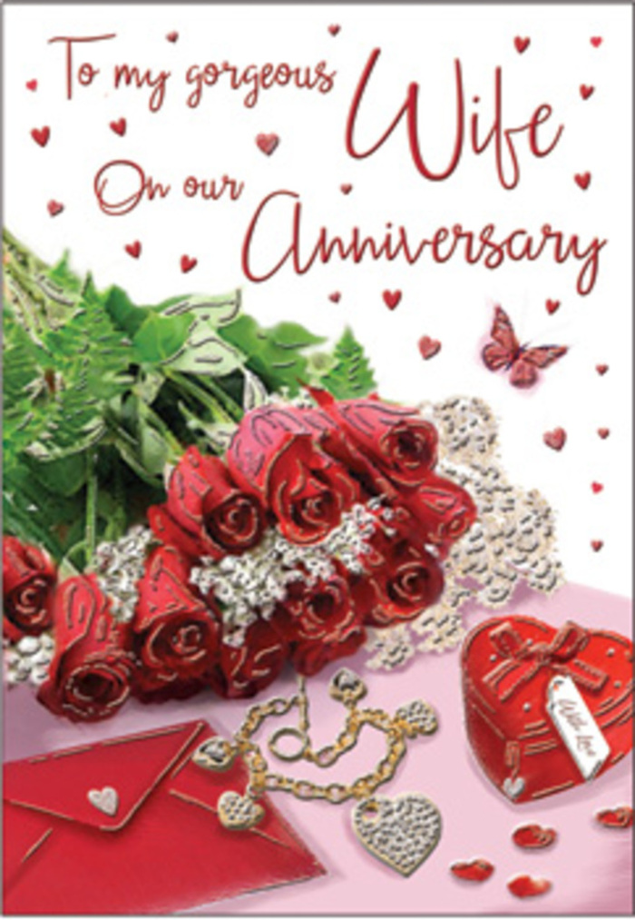 Here, an anniversary still life unfolds like a secret shared between two people, reminiscent of a quiet moment above the bustling streets of Spitalfields. The focal point is a posy of deep crimson roses, their swirling petals layered and velvety, each bloom holding the saturated red of mature love. The flowers seem to lean forward from the card beneath them, as if stepping out of a painter's canvas, their colour intensified by soft, feathery greenery that surrounds and supports each head. Nestled into this romantic backdrop lies a scarlet jewellery box, tied with a neat ribbon, its plush exterior suggesting soft fabric under the fingers. From it, or placed very close by, a golden necklace shaped into intertwined hearts glows subtly, the metal reflecting ambient light like a trace of sunshine lingering after a late afternoon stroll around Old Spitalfields Market. The card itself features gently flowing handwriting, only partly revealed, but clearly heartfelt, the inked words drifting among a cascade of tiny red hearts printed or scattered across the surface. Sparkling decorations, perhaps sequins or small gems, twinkle in and out of focus, giving the impression of a light dusting of stardust, while the overall lighting is warm and enveloping, without harsh contrasts. Shadows are soft, edges are tender, and the combined effect of roses, jewellery, card, and glittering hearts creates a serene, intimate vignette. It feels like a tribute to anniversaries spent side by side-quiet dinners in converted warehouses, walks through nearby lanes-and a promise of many more shared chapters yet to come.